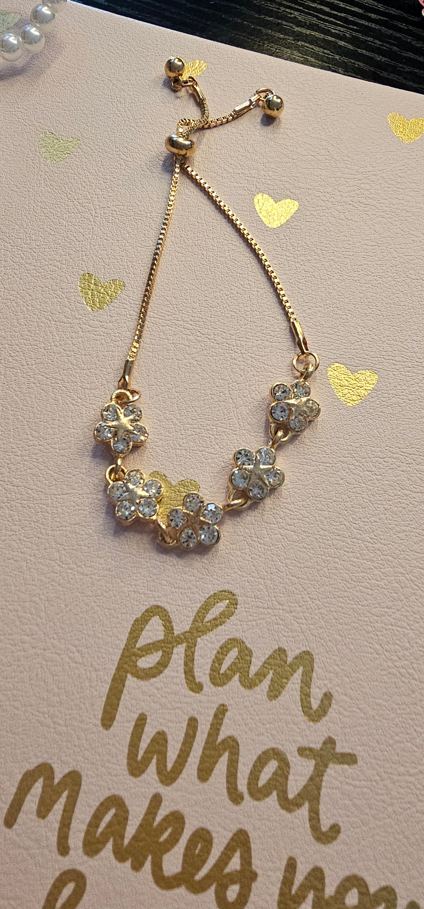 Adjustable Gold-Tone Multi-Flower Bracelet