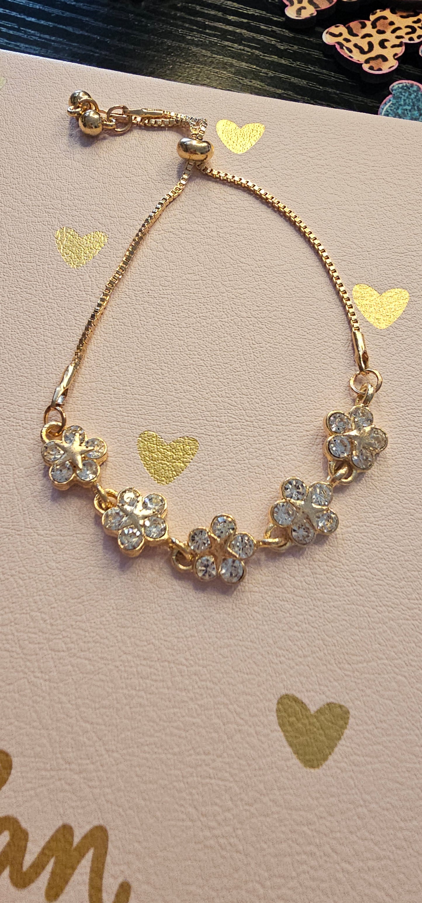 Adjustable Gold-Tone Multi-Flower Bracelet