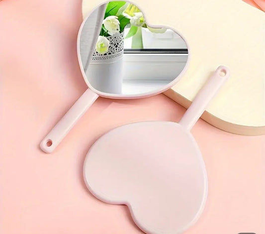 Heart-shaped travel size mirror