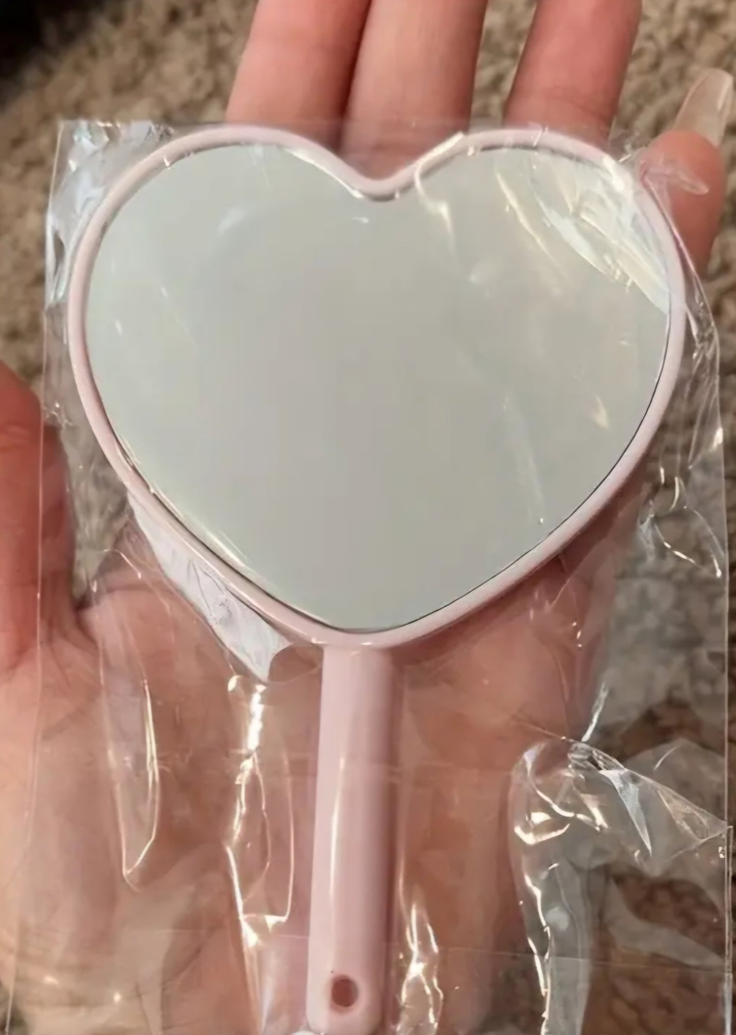 Heart-shaped travel size mirror